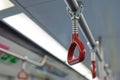Red handle for standing passengers inside bus or train whit copy space Royalty Free Stock Photo