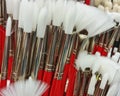 Red handled paint brushes