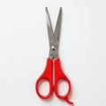 Red handled scissors isolated on white background for cutting and crafting Royalty Free Stock Photo