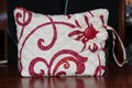 Red handmade cosmetic bag. women`s trivia. Handbag for cosmetics. We do it with our own hands Royalty Free Stock Photo