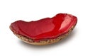 Red handmade glazed ceramic plate isolated on white background Royalty Free Stock Photo