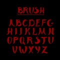 Red handwritten calligraphic alphabet. Made in