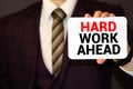 Red Hard work ahead warning sign with copy space. Business concept on Hard work for successful in career