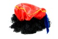 Red hat and black hair of Zwarte Piet Royalty Free Stock Photo