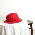 Red hat on a table isolated on transparent background Royalty Free Stock Photo