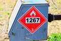 A red hazard 1267 Petroleum Crude Oil sign