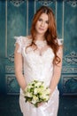 Red head bride with bouquet Royalty Free Stock Photo