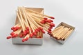 Red head matches in a white big opened box and one small box on Royalty Free Stock Photo