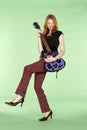 Red Head Rock and Roll Guitar Player with Leg Up