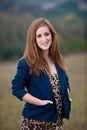 Red-headed teen girl outdoors Royalty Free Stock Photo