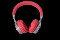 Red headphone and cable isolated on background..Headphones.Red headphone.Technology Royalty Free Stock Photo