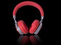 Red headphone and cable isolated on background..Headphones.Red headphone.Technology Royalty Free Stock Photo
