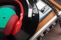 Red headphones for listening to old vinyl records Royalty Free Stock Photo