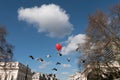 Red heart balloon and flying pigeons Royalty Free Stock Photo