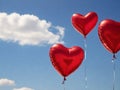 A red heart balloon is a delightful and charming inflatable object .