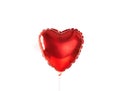 Red heart balloon on ultra violet background.