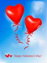 Red heart balloons with ribbons in blue sky. Royalty Free Stock Photo