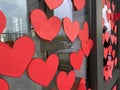 Red heart banner boards on window outdoor. Empty hearts with copy space
