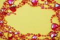 Red heart bead border frame with space copy on Yellow background Royalty Free Stock Photo