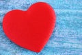 Red heart on a blue abstract background