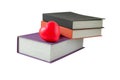 Red heart on books, Love concept on white Royalty Free Stock Photo