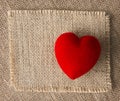 Red heart on burlap, sackcloth background. Valentines Day Royalty Free Stock Photo