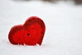 Red heart candle in the snow, a gift for loved ones Royalty Free Stock Photo