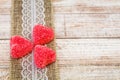 Red heart candy and burlap lace on wooden board Royalty Free Stock Photo