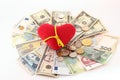 Red heart on cash Royalty Free Stock Photo