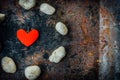 Red heart in circle of rocks Royalty Free Stock Photo