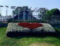 Red heart of flowers embedded in the grass at Rocky Point Park, September 11, 2020