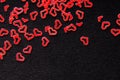Red heart confetti on black Royalty Free Stock Photo