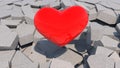 Red heart on cracked floor