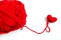 Red heart crochet with yarn on white background