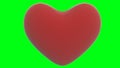 Red heart 3d render isolted on a green background