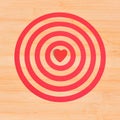 Red heart on dart board game on wood ,Valentine Royalty Free Stock Photo