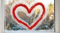 Red heart drawn on frosty winter window Royalty Free Stock Photo