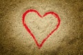 Red heart drawn in the sand Royalty Free Stock Photo