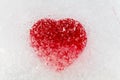 Red heart frozen in ice center