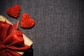 Red heart with gift box on a dark background Royalty Free Stock Photo
