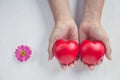 Red heart on girl hand. concept for valentine`s day Royalty Free Stock Photo