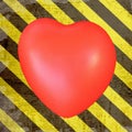 Red heart on grunge hazard stripes Royalty Free Stock Photo