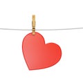 Red heart hanging on rope with clothespins, isolated on white, romantic message