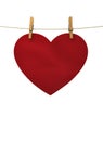 Red heart hanging on a string pinned clothespins, a concert for Royalty Free Stock Photo