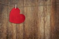 Red heart hanging on Wood Background and Texture vertical, Vintage toned Royalty Free Stock Photo