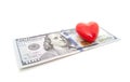 Red heart in hundred dollar note