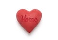 Red heart with imprinted home word over white background Royalty Free Stock Photo