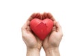 Red heart with imprinted house shape in man`s hands. Royalty Free Stock Photo