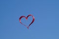 Red heart kite flying in the air Royalty Free Stock Photo