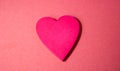 Red heart with letter words of give isolated on pink background. Giving, sharing, charities and donate concept